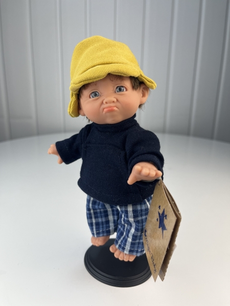 картинка испанские Кукла Джестито "Инфант", 18 см, в брюках в клетку, недовольный арт. 10000U-10 интернет-магазин TuKiTu.ru